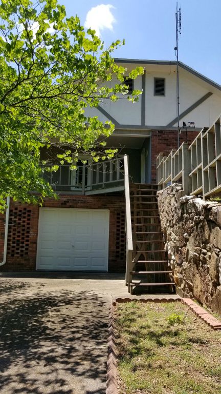 Utility/Storage with Covered Wood Deck Above