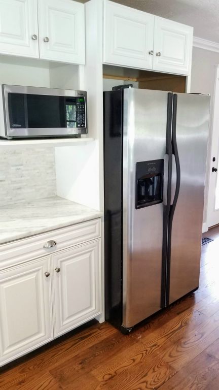 Kitchen with Marble Countertops & New Cabinets